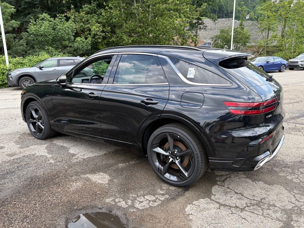 2026 Genesis GV70 — rear three-quarter view